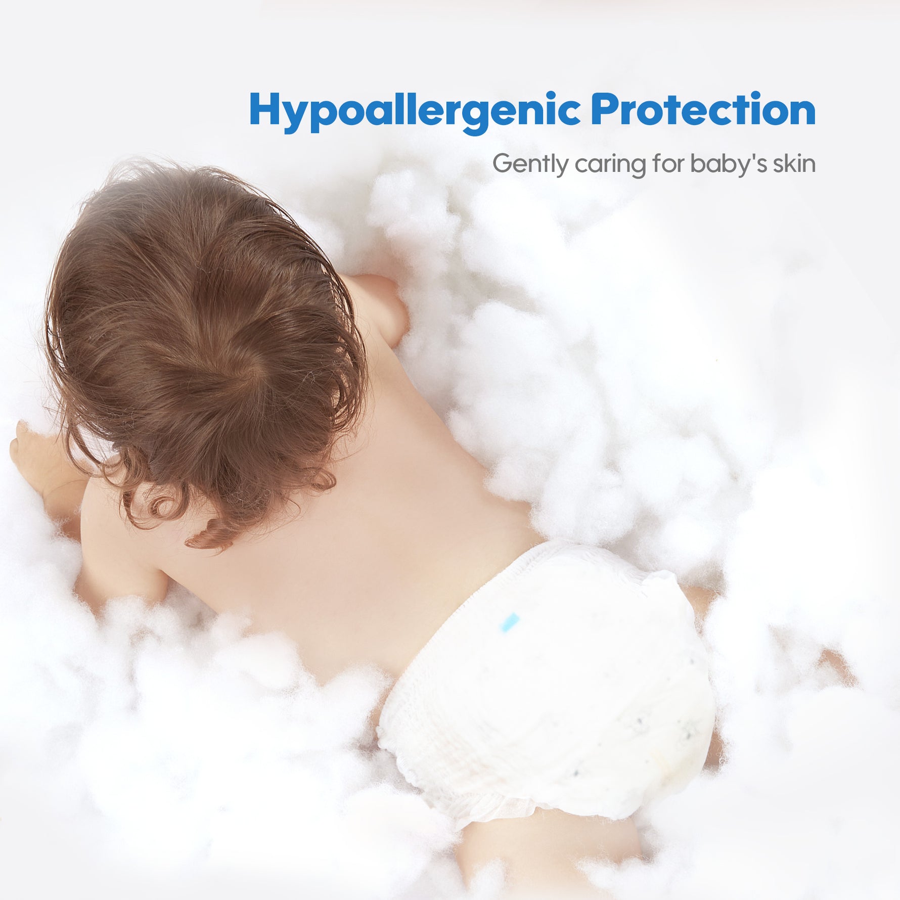 The photo shows a baby wearing an Aiwibi diaper pants, crawling on soft cotton.